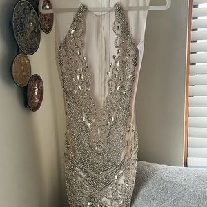 dress is in very good condition, only worn once perfect for any occasion!